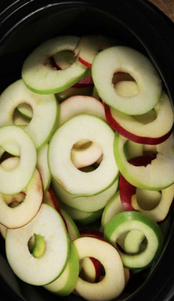 Put apple slices in slow cooker for a delicious dessert you won’t feel guilty eating